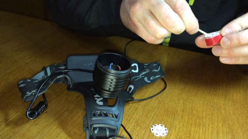 Cleaning the contacts inside the lighting fixture