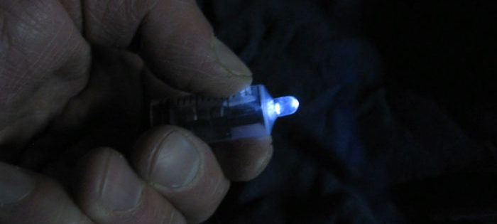 Figure 7. Using a homemade flashlight in a dark room.