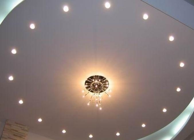 Spot lights often complement the chandelier.