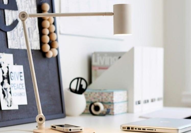 The wireless charger is a great addition to the modern desk lamp.