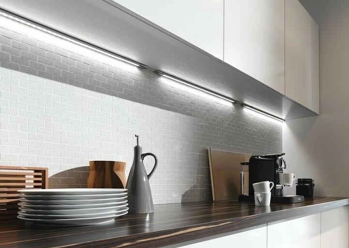 The option of installing a strip or lights in the corner between cabinets and the wall.