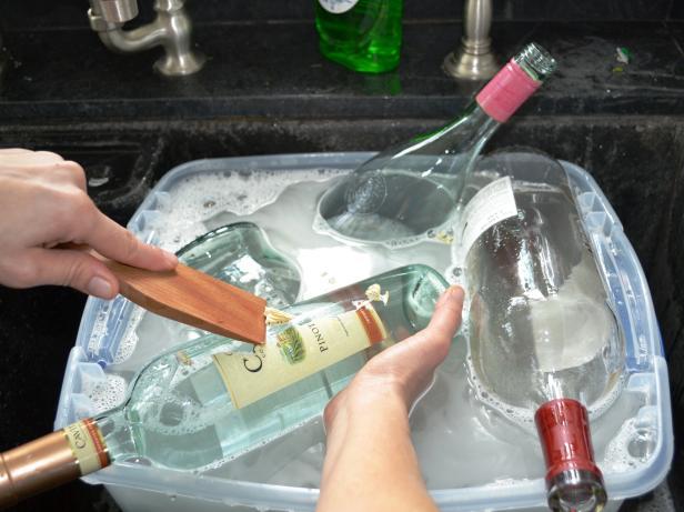 preparing bottles for chandelier making